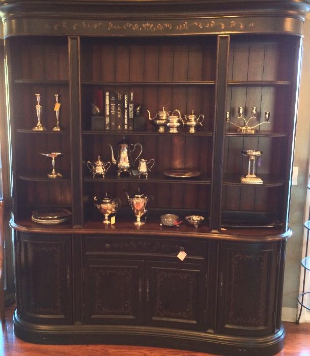 Stunning display cabinet with silver plate.