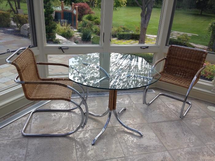 GLASS TABLE & CHAIRS WITH METAL AND WICKER