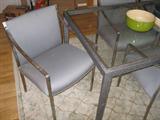 Glass/chrome table with 6 chairs - $325