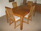 Oak table with 2 leaves and 6 chairs - $195