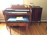 Organ. Piano Bench. Sheet music cabinet. Microphone.