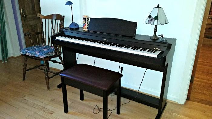 Ethan Allen Captains Dining Chair, Roland Electronic Piano. Bench is Full of Music Books