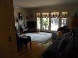 View of Living Room with Wonderful Pieces, Carpet, 2 Couches, Small Sitting Chair (Clock and Drapery not for sale)