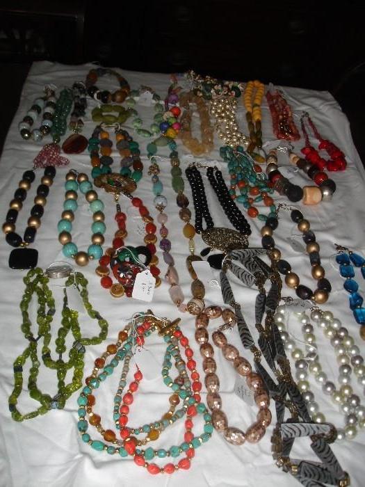 Assorted costume jewelry, tumbled stone, glass, carved stone, wood beads, etc.