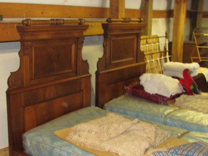 Antique walnut Victorian panel twin beds turned legs