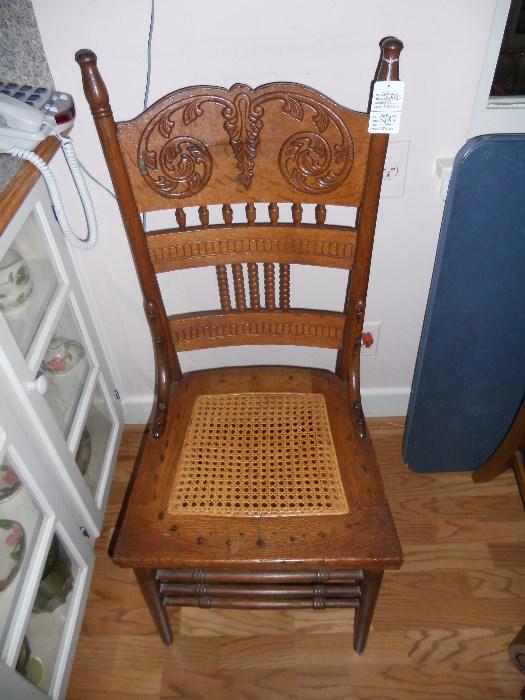 Lovely oak side chair with caned bottom