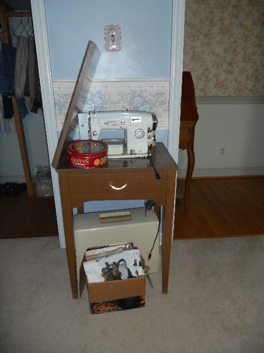 Singer Sewing Machine in cabinet