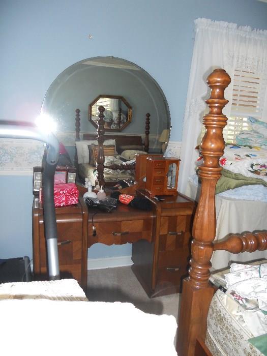 Dresser with round mirror matches bed and dresser
