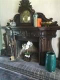Fireplace tools, rose bowl, books, and other décor (mantel & clock - not for sale);