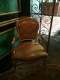 Gold French upholstered arm chair;