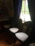 Antique chairs (carved flowers on the top of the curved backs-----Leverett Estate);