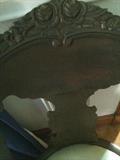 One of several rose carved antique chairs;