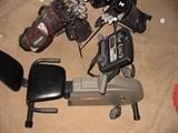 Recumbent exercise bike, golf club sets.