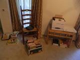 Books, ladder back chair, bamboo end table