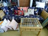 Rattan sofa, pillows, bamboo end table
