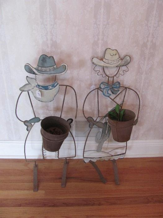 Outdoor cowboy and girl planters