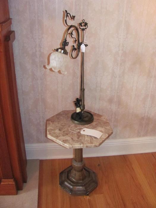 Marble accent table and a lamp