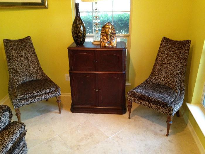 animal print chairs & cocktail cabinet