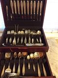 International Sterling Silver "Prelude". Besides typical knives, forks, salad forks and teaspoons, sugar tongs, demitasse spoons, butter knives and serving pieces including pie/cake server.