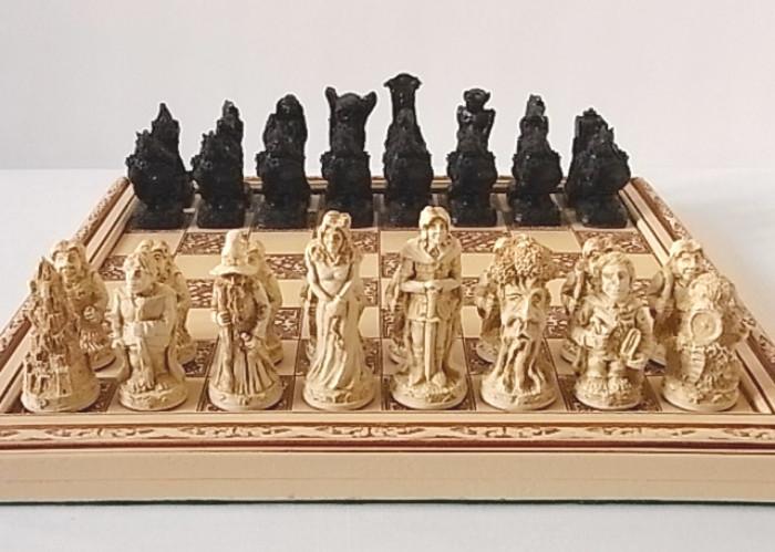 LORD OF THE RINGS CHESS SET "MADE IN ENGLAND" - "PIECES ARE IN ORIGINAL BOX WITH PAPERWORK". NO BOARD WITH THIS SET, THE BOARD PICTURED IS DISPLAY ONLY.