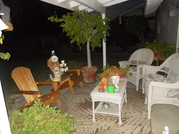 patio furniture, plants and trees
