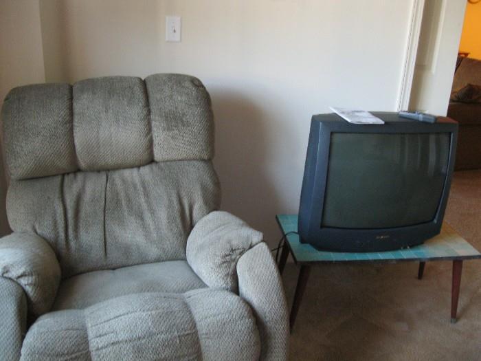 Overstuffed Recliner, Unique Rotary International Table, and a Sharp 25R M100 TV