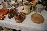 Frankoma masks, beer stein and astrology trivet. Razorback plaques