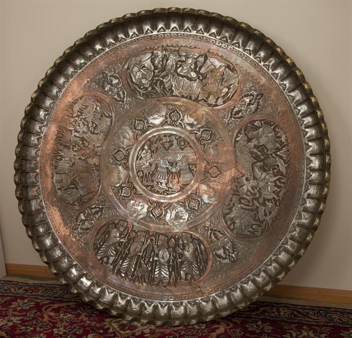 Amazing, large (36 inch diameter) tinned copper hammered and incised tray, signed.