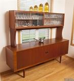 Danish side board buffet ( 66.5 T x 78.5 W x 19.5 deep). Really nice condition. Sliding Tambour doors on credenza base. 