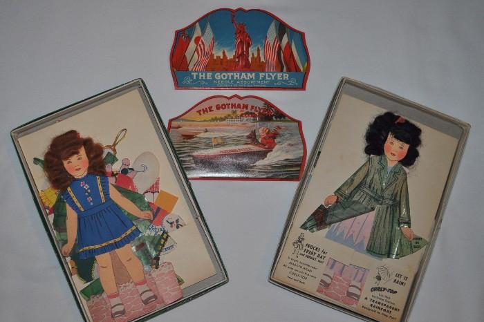 A couple of Curly-Top dolls in the original boxes... and the Pièce de résistance:  The Gotham Flyer sewing needle folders that are absolutely, totally, amazing WONDERFUL and in PERFECT condition!  