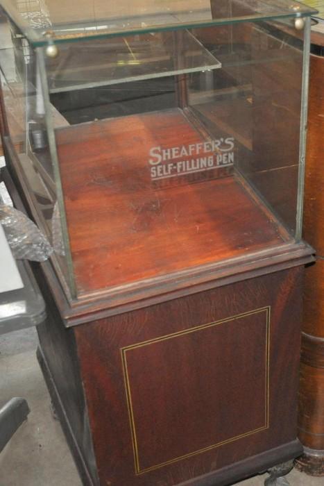 Beautiful Sheaffer's pen display cabinet.  Opens from the back.  Sits proudly on 4 iron curved legs.