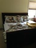 Burnhardt 3 panel cherry sleigh bed