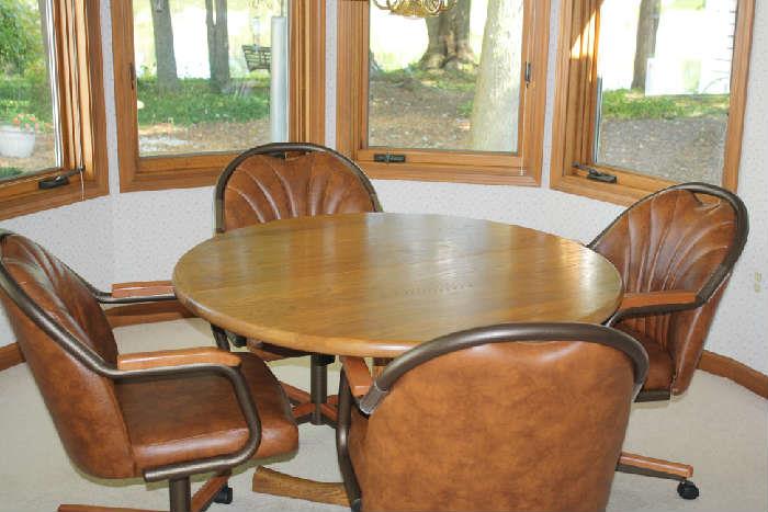 LOVELY TABLE W/ LEAF 4 CHAIRS ON CASTERS