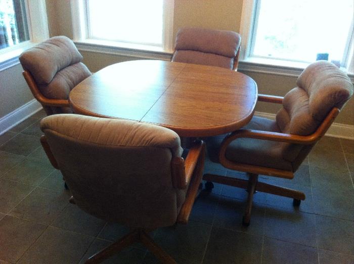 5-piece dinette set: pedestal table with leaf and 4 microfiber upholstered chairs. Perfect for dining or game table.
