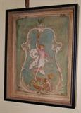 antique pair of painted stove doors in museum frames