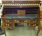 Bombe secretary with leather writing surface