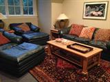 leather three piece living suite. rug not for sale