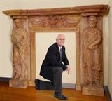 Lot 1029:  CARVED FIGURAL ROSSO VERONA MARBLE FIRE SURROUND: Shaped pediment, carved figural neo-classical figures on supports, insert with figural cherubs, bird and floral swag. Sold with 2 marble spacers. Overall measures approx. 62 3/4'' h. x 82'' x 14 3/4'', opening 45 1/2'' h. x 35''.
CONDITION: Several repairs marble, shipper note VERY heavy, separates into 8 sections for transport.