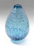 Lot 1055:  DUNCAN MCCLELLAN ''MEN-A-MORPHASIS'' ART GLASS VASE: Large vase in a pale blue with graduating figures of men all over. Titled Men-A-Morphasis, signed on base, measures 21'' h. x 14''. Est. $3000/5000**