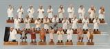 Lot 1352:  28 PRETZL CARVED WOOD FIGURES: Collection of assorted professions, most appear to be medical or scientific in nature. Many with original Pretzl labels. Approx. 6'' tall each.