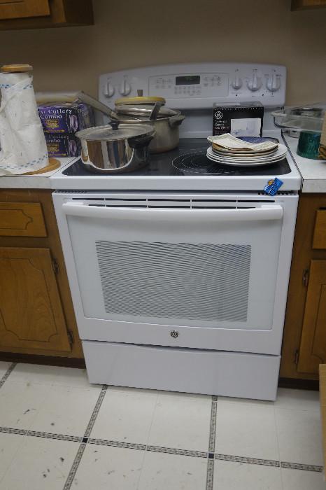 like new electric stove purchased in January 2014 used once!!!