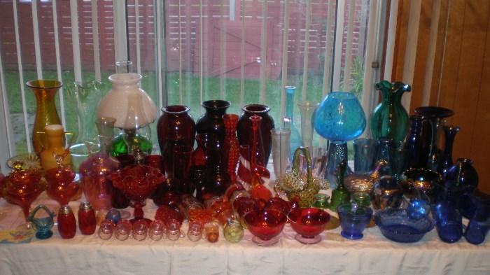 Large selection of gold, red, orange, green and blue glass. About half the glass is sold.