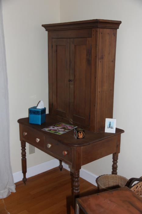 Antique curio/display case on table with turned legs (two pieces)