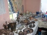 folks we have tables and tables of smalls including silver plate and sterling items