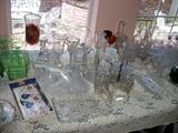 just a fraction of the vintage crystal for sell including decanters, pickle servers, vases, epergnes, baskets-etc etc