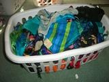 three baskets full of lady's scarves, many brand new, silk, and some vintage