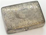 ORNATE ANTIQUE STERLING SILVER BOX. MEASURES APPX. 3" X 4" X 1". WITH AMETHYST CABACHON BUTTON OR CLASP.
