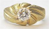 HEAVY 18K RING WITH 1.35 CARAT DIAMOND CENTER.