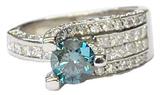 14K Ladies' White Gold Ring w/Appx. 1 Carat Blue Diamond Center and 1 Cttw. Diamonds Surrounding.