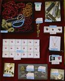 Wide-Angle Photo of Jewelry, Gemstones & Pocketknives.